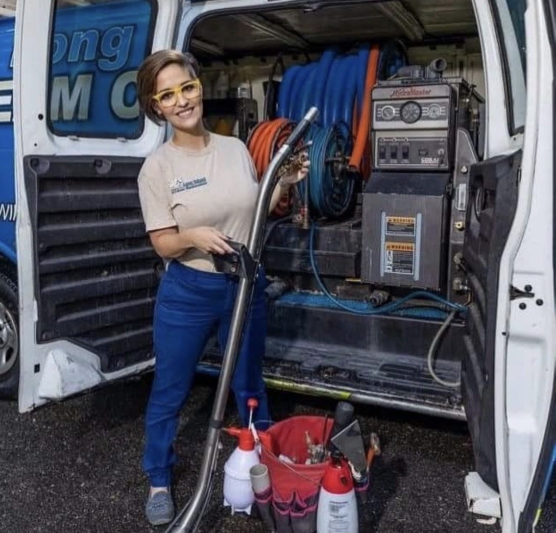 Team member with the truck-mounted equipment in the van